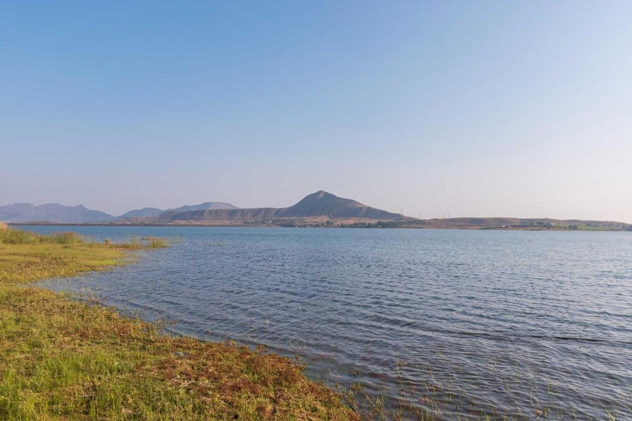 Luna Villa By Stayvista - Lakeside Charm With Terrace, Lush Lawn & Modern Decor Nashik Exterior photo